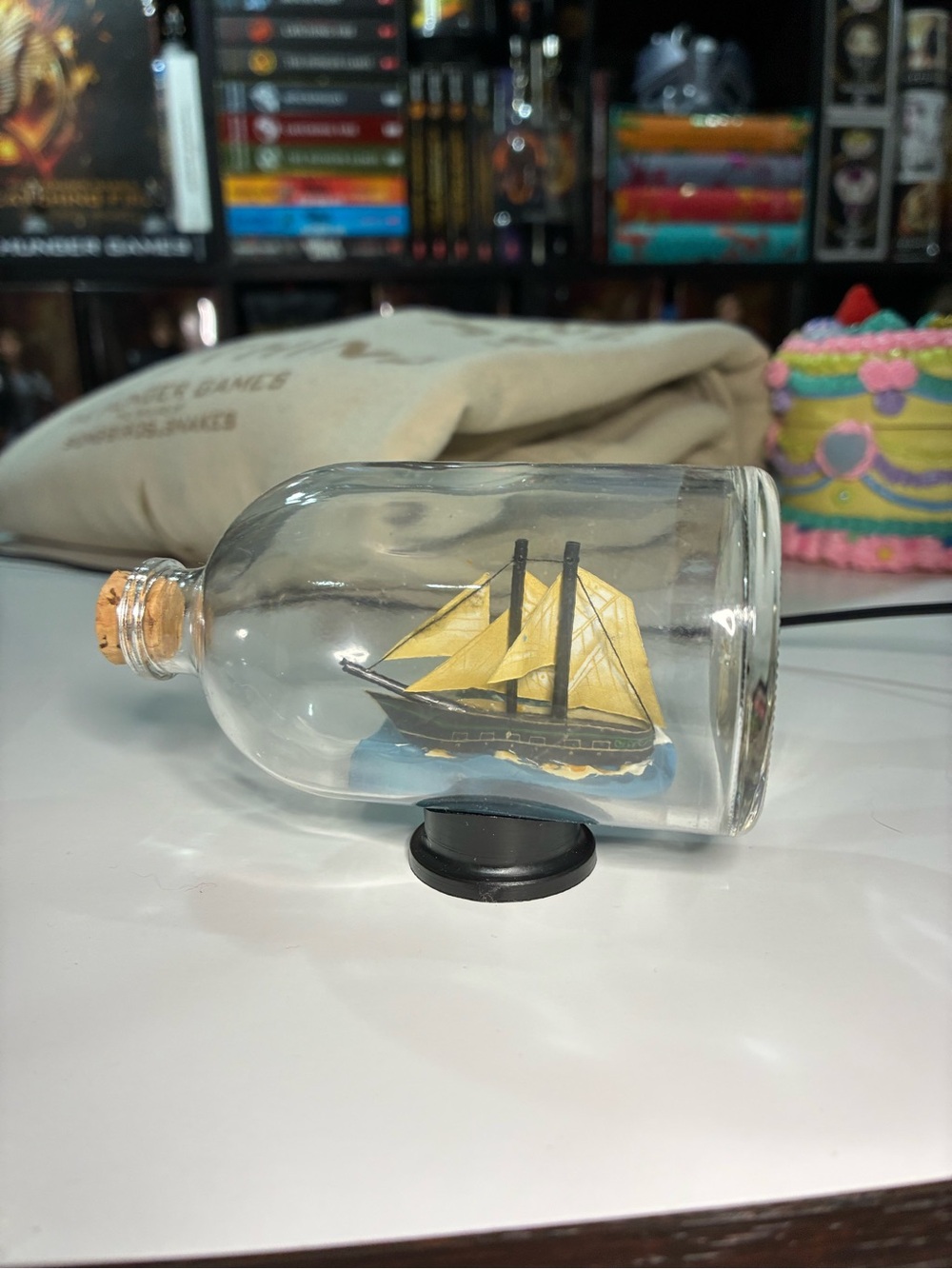 Miniature Ship in a Bottle with Yellow Sails
